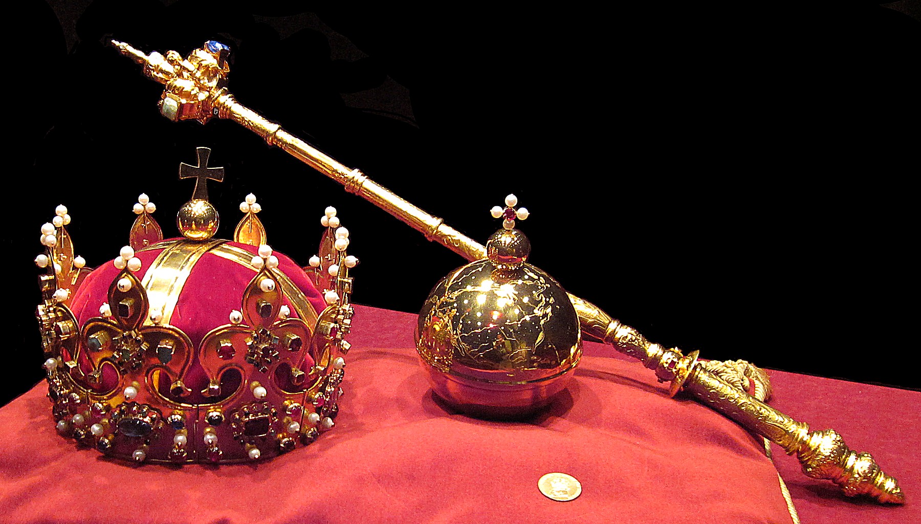 A crown, sceptre and orb of royal regalia