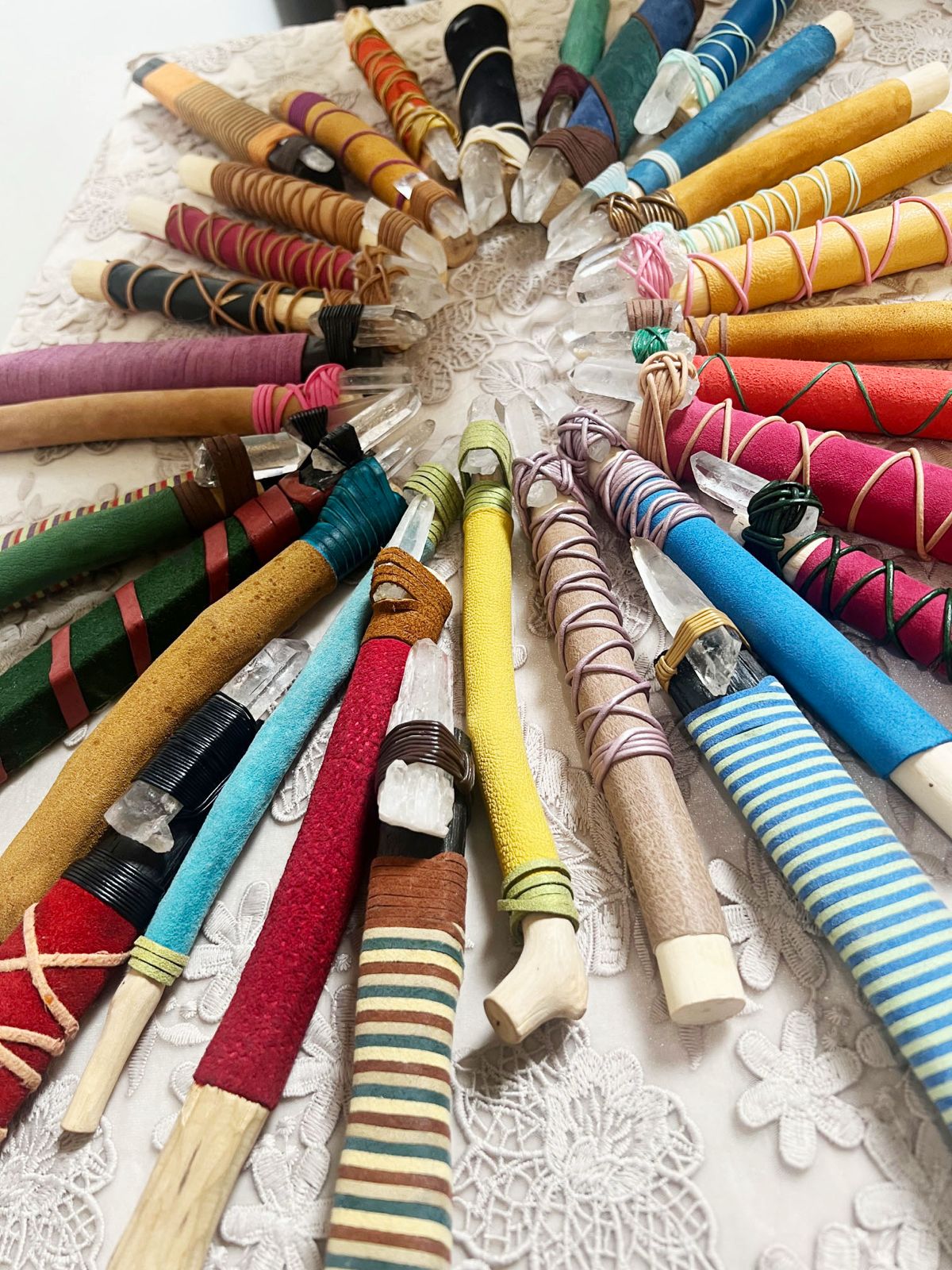 A fan of hand-wrapped crystal wands used in Life Activation sessions