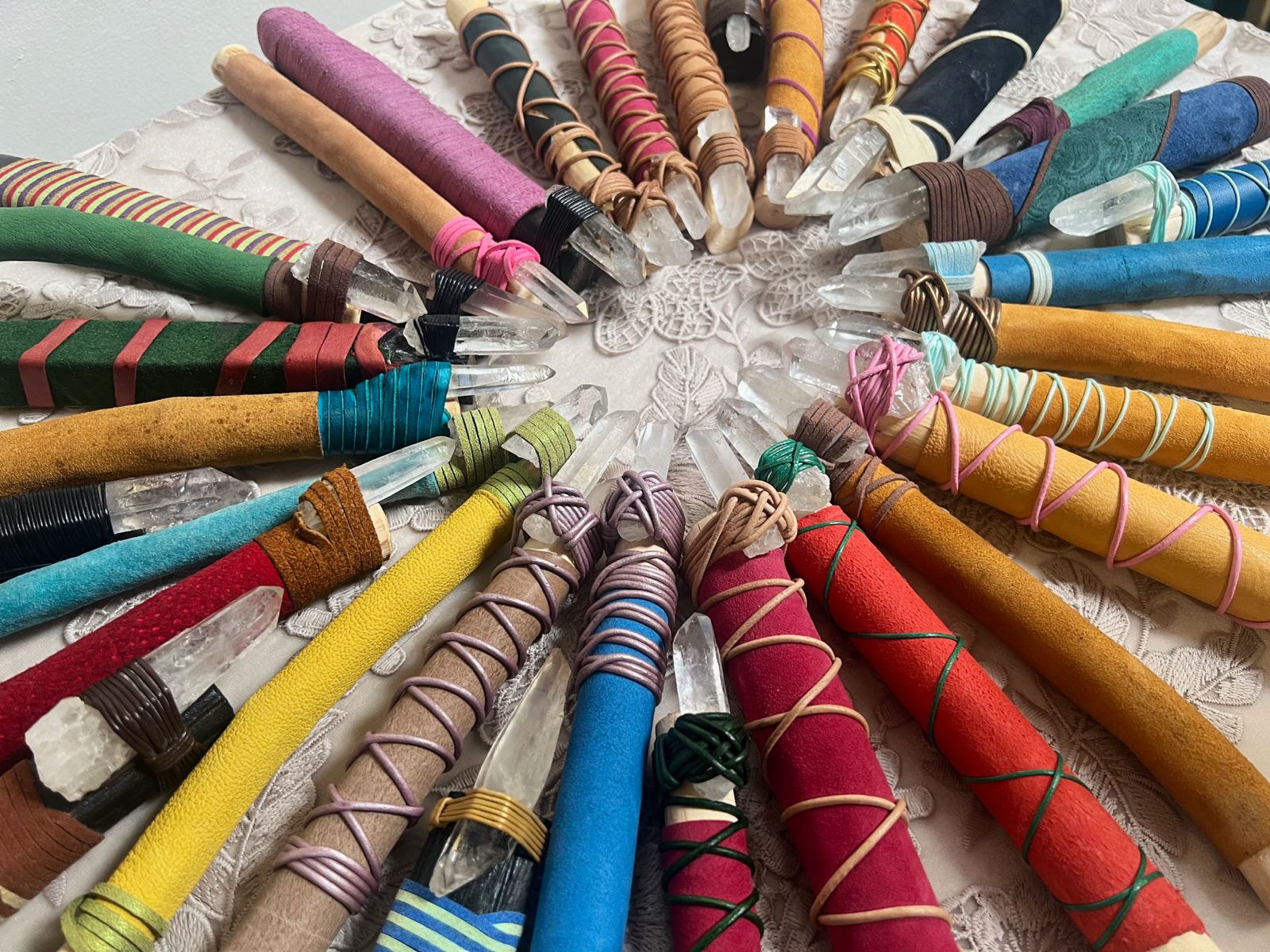 A circle of hand-wrapped crystal wands used in Life Activation sessions