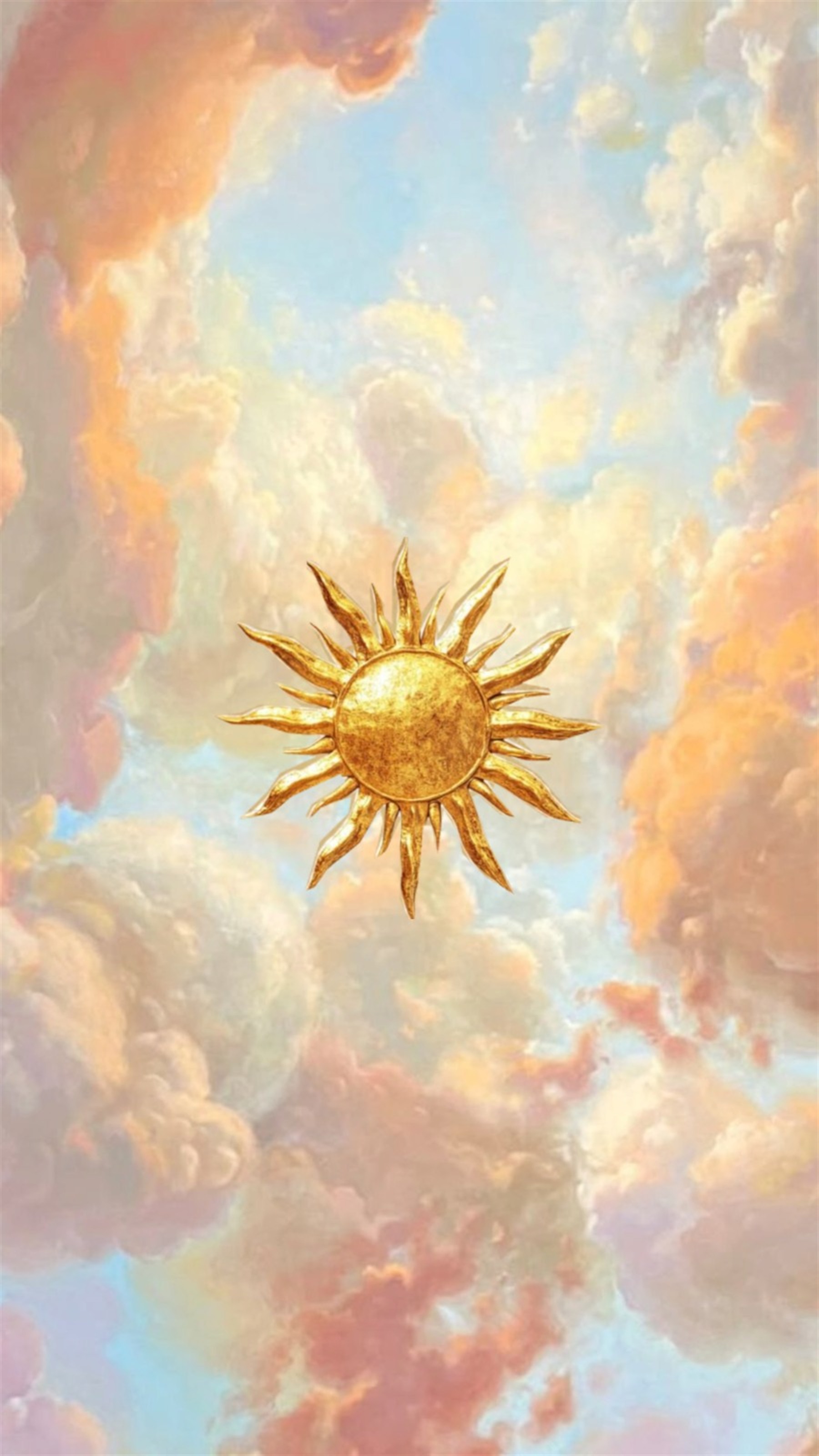 Golden sun breaking through soft clouds